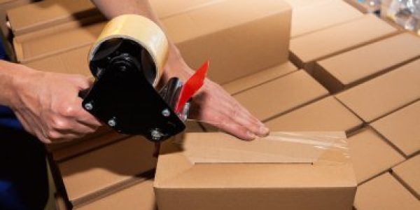 depositphotos_30962329-stock-photo-packing-a-carton-boxes